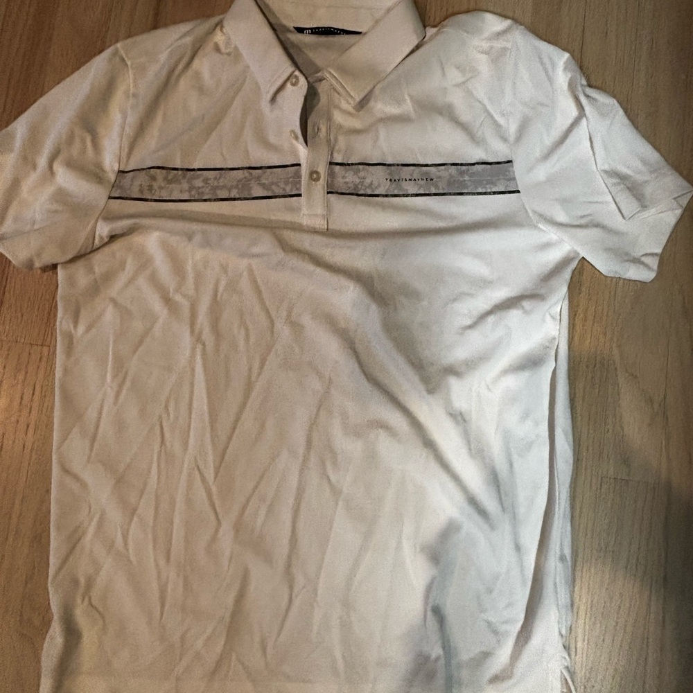 Travis Mathew White Polo with Black Stripe